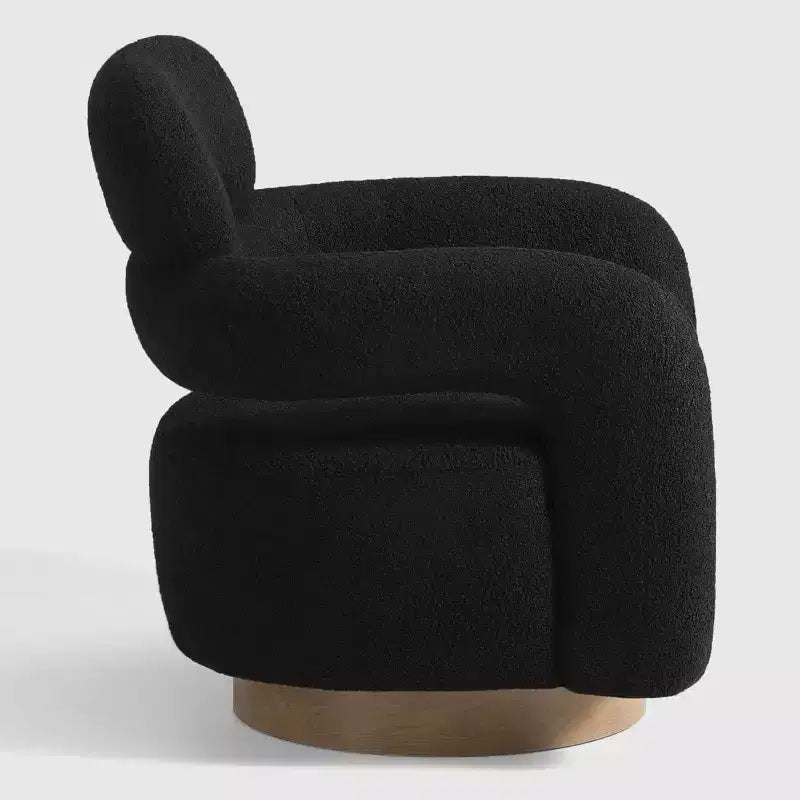 Fauteuil pivotant rond effet peau de mouton d'inspiration Mid-Century Modern