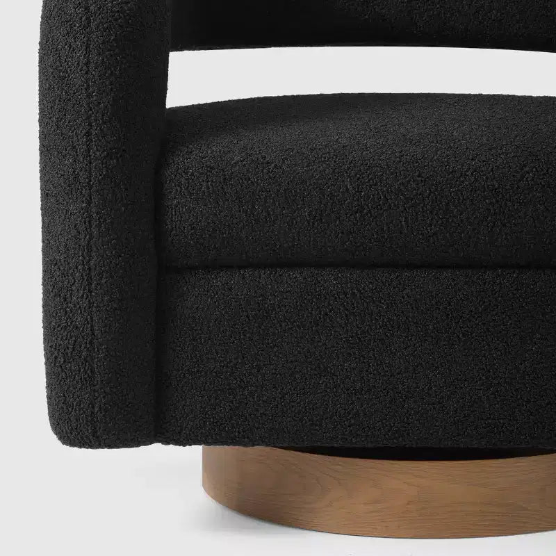Fauteuil pivotant rond effet peau de mouton d'inspiration Mid-Century Modern