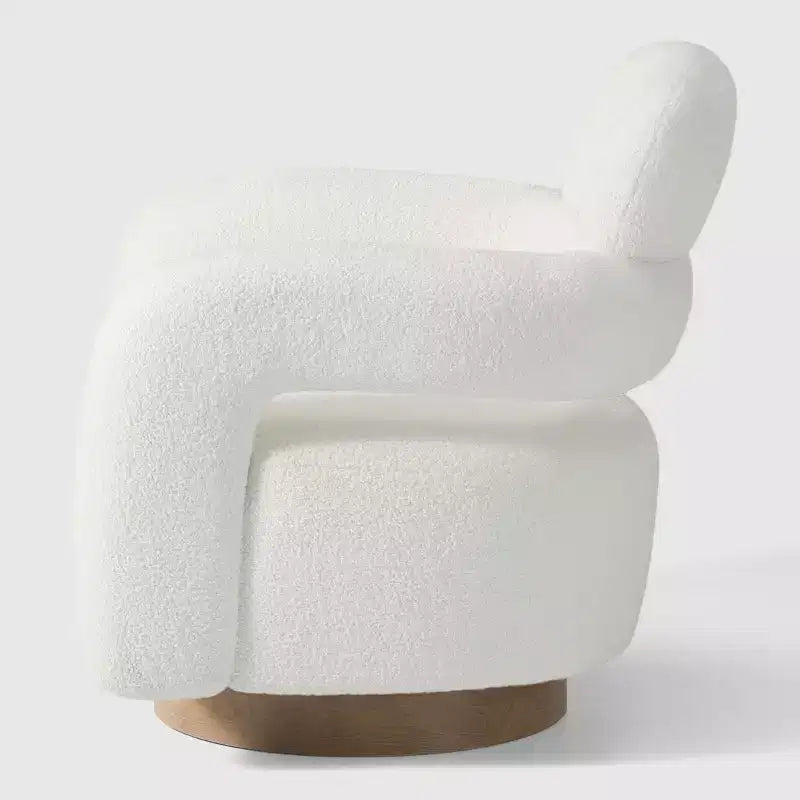 Fauteuil pivotant rond effet peau de mouton d'inspiration Mid-Century Modern