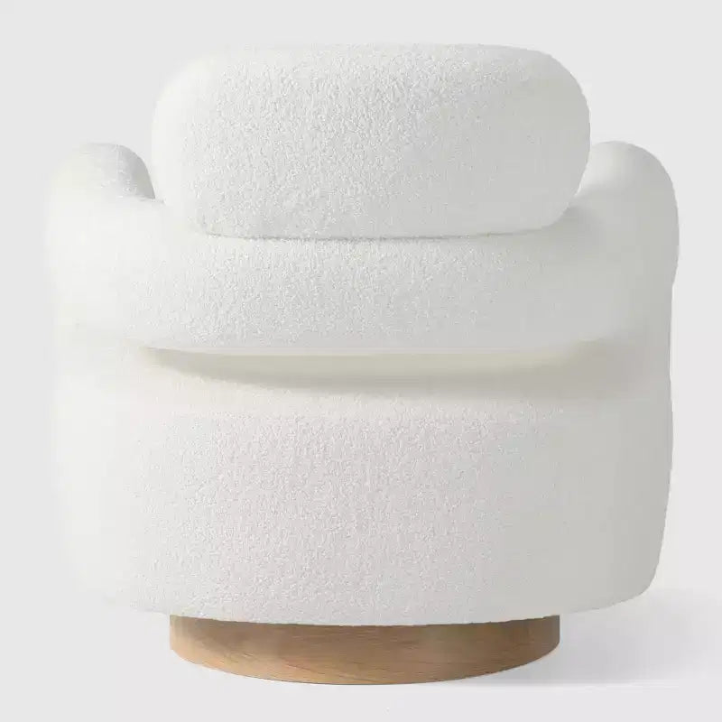 Fauteuil pivotant rond effet peau de mouton d'inspiration Mid-Century Modern