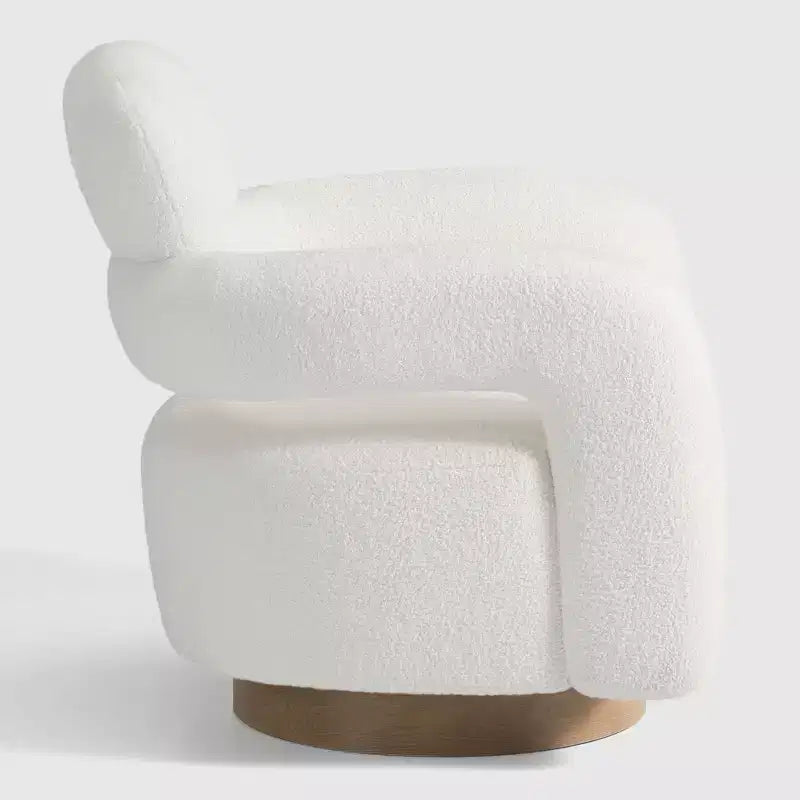 Fauteuil pivotant rond effet peau de mouton d'inspiration Mid-Century Modern