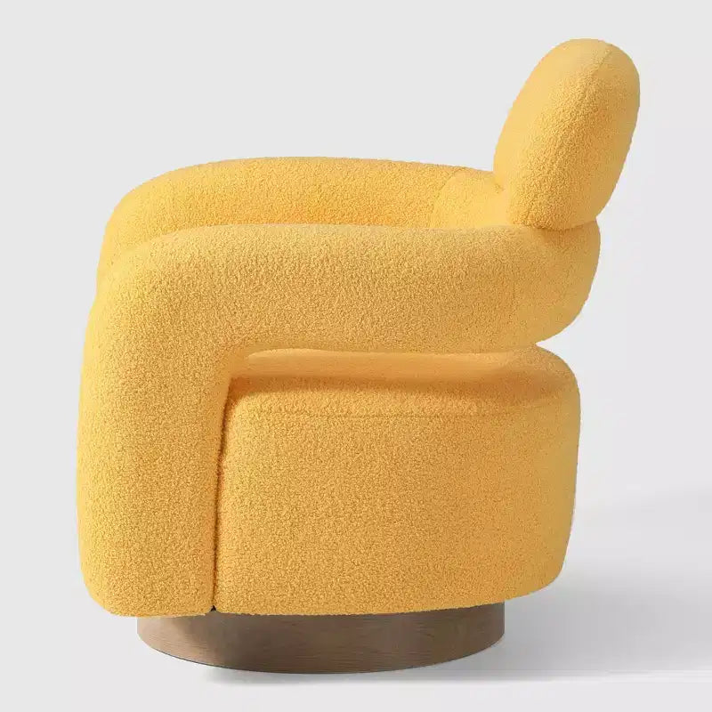 Fauteuil pivotant rond effet peau de mouton d'inspiration Mid-Century Modern