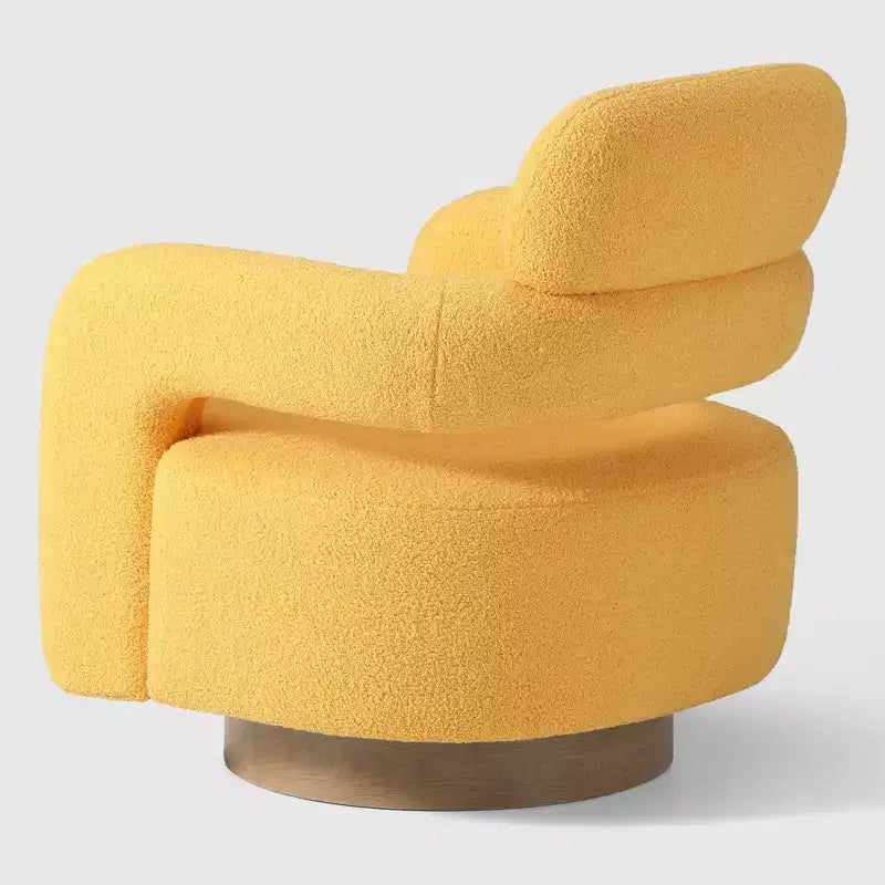 Fauteuil pivotant rond effet peau de mouton d'inspiration Mid-Century Modern