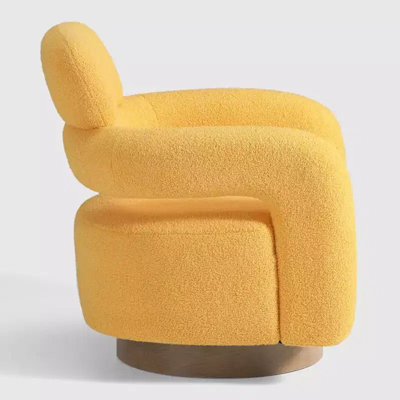 Fauteuil pivotant rond effet peau de mouton d'inspiration Mid-Century Modern