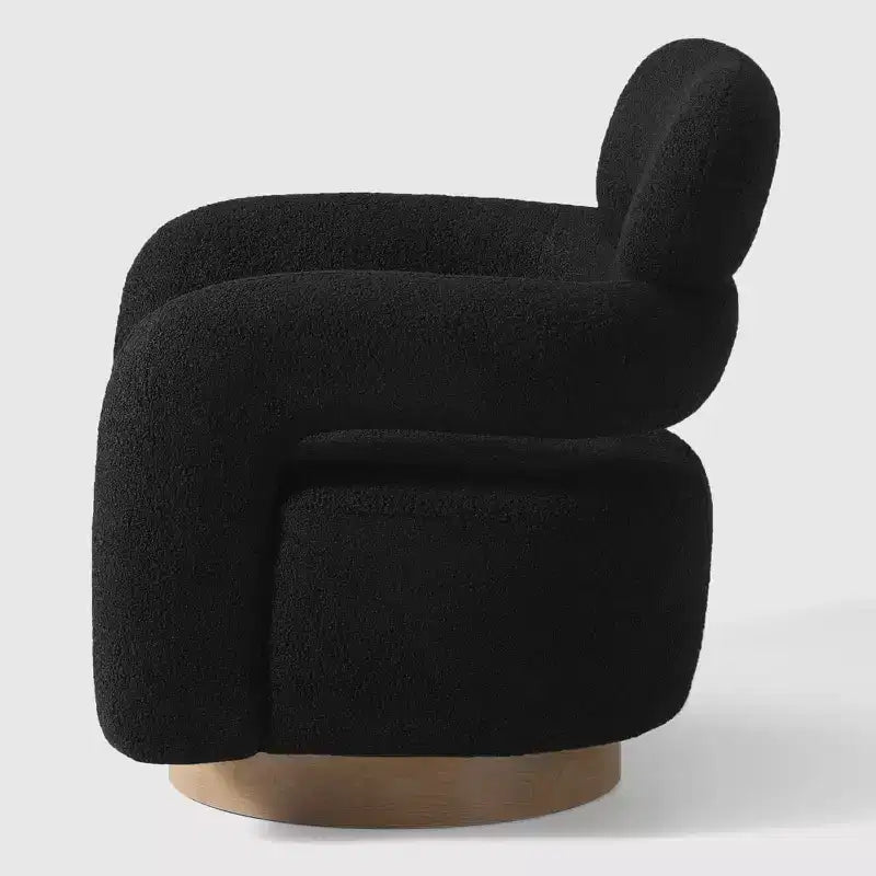 Fauteuil pivotant rond effet peau de mouton d'inspiration Mid-Century Modern